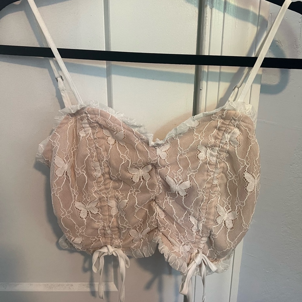 Lacy white top with cute butterfly details